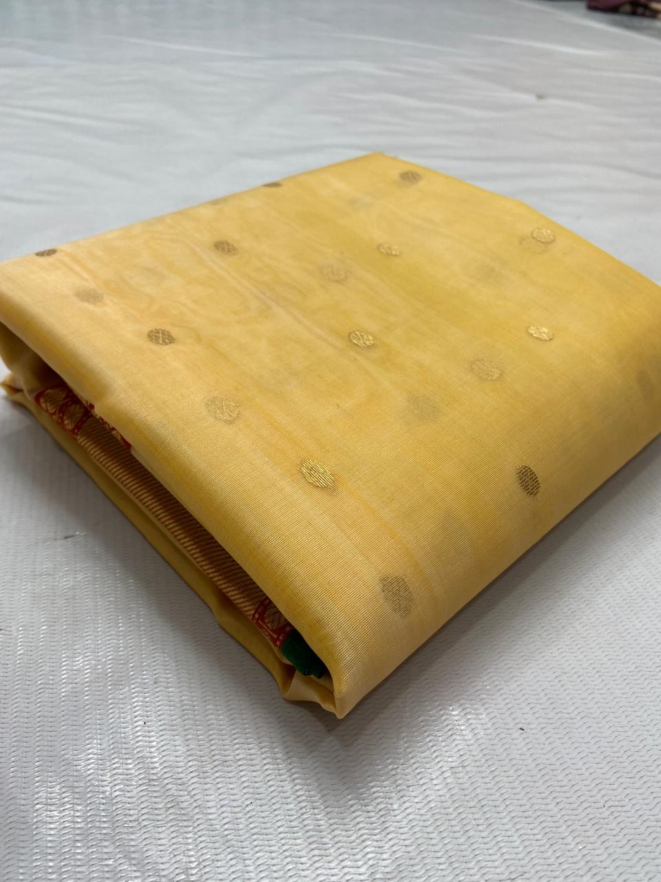 Pale Yellow Chanderi Handloom Katan Silk saree featuring intricate Nakshi borders and a detailed matching Nakshi pallu.