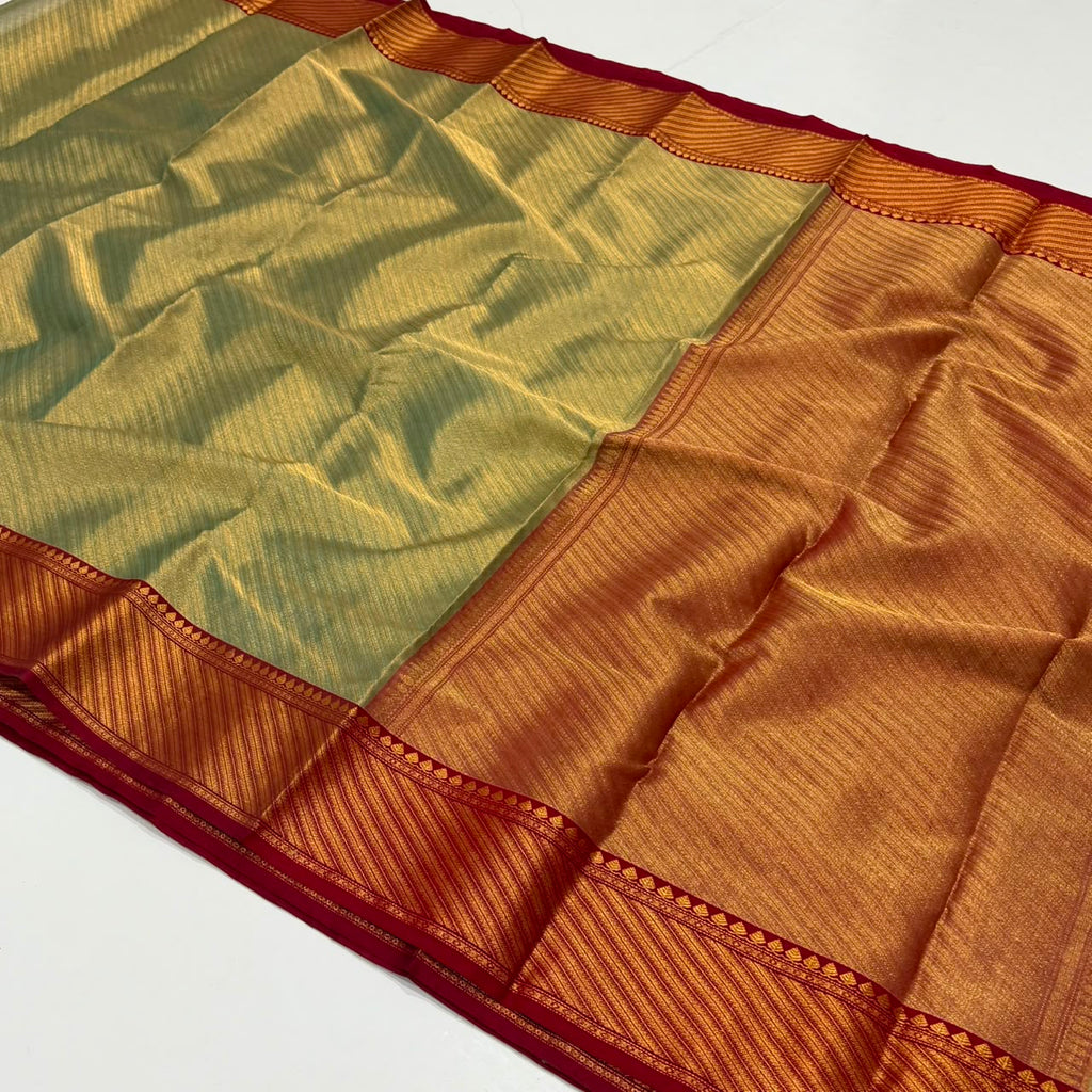 Dual-tone olive green and gold Chanderi Handloom Katan Silk saree with a rich maroon border and intricate Nakshi weaving.