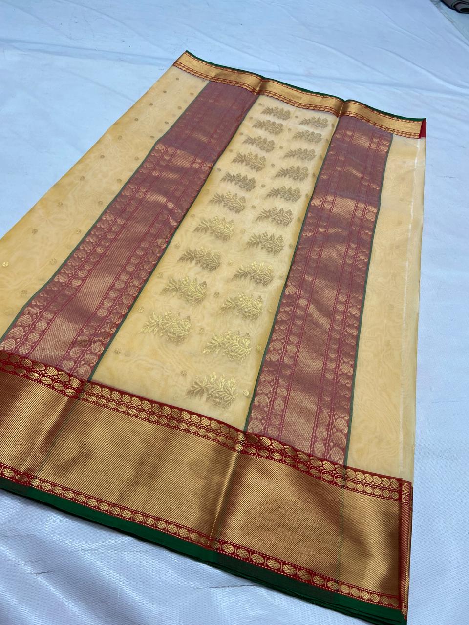 Pale Yellow Chanderi Handloom Katan Silk saree featuring intricate Nakshi borders and a detailed matching Nakshi pallu.