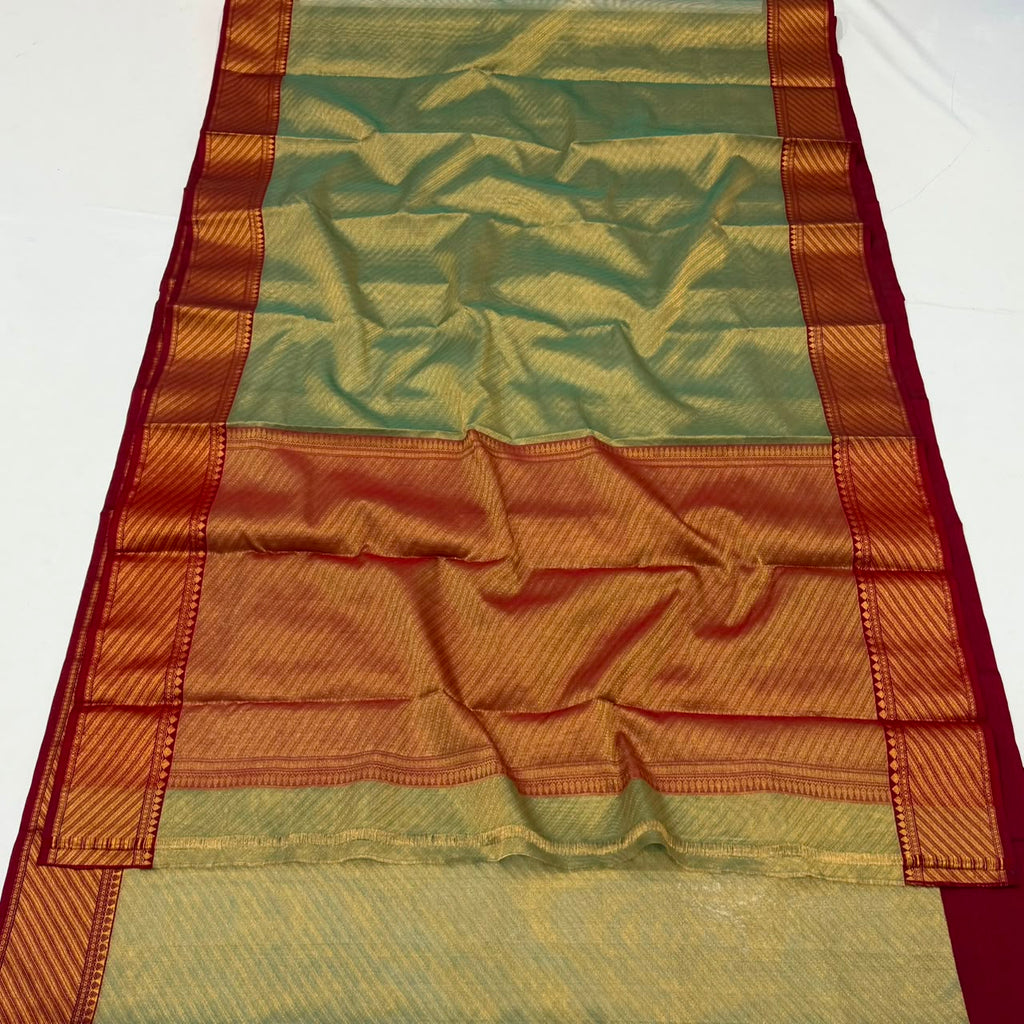 Dual-tone olive green and gold Chanderi Handloom Katan Silk saree with a rich maroon border and intricate Nakshi weaving.