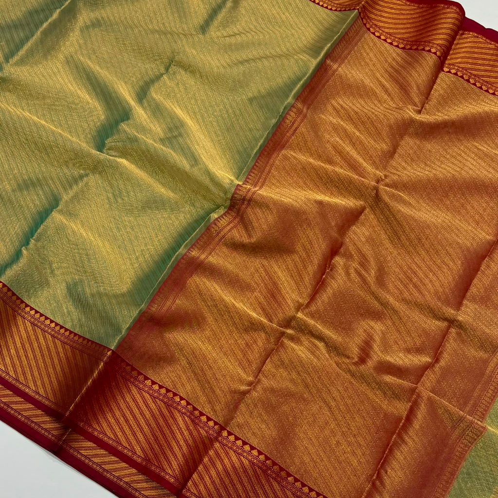 Dual-tone olive green and gold Chanderi Handloom Katan Silk saree with a rich maroon border and intricate Nakshi weaving.