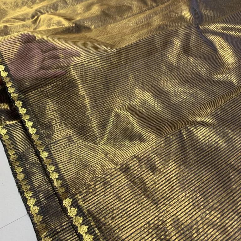 Black Chanderi Handloom Pattu Silk saree featuring intricate, small Nakshi work along the borders.