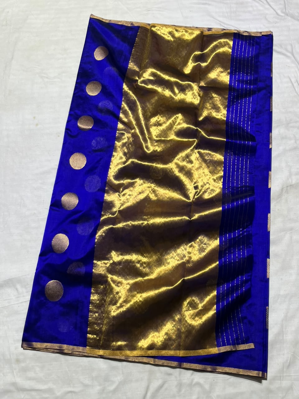 Vibrant Royal Blue Chanderi Handloom Pattu Silk saree featuring gold zari polka dot motifs and a rich gold border.