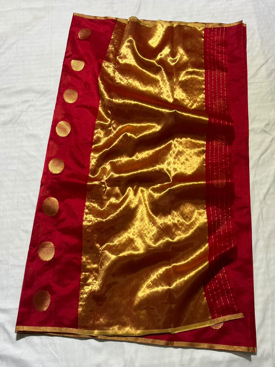 Deep Red Chanderi Handloom Pattu Silk saree with gold zari polka dot motifs and a rich golden border.
