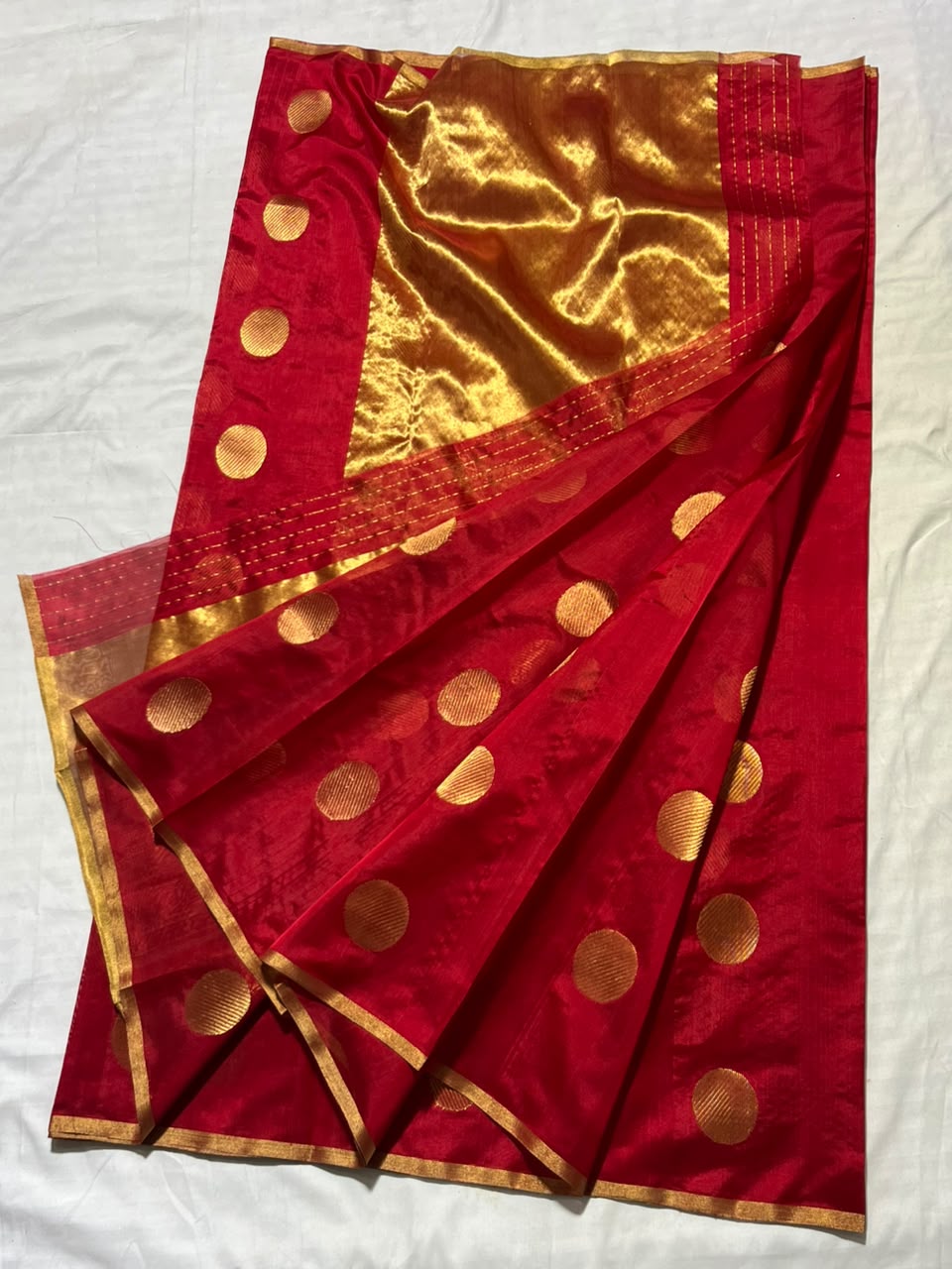 Deep Red Chanderi Handloom Pattu Silk saree with gold zari polka dot motifs and a rich golden border.
