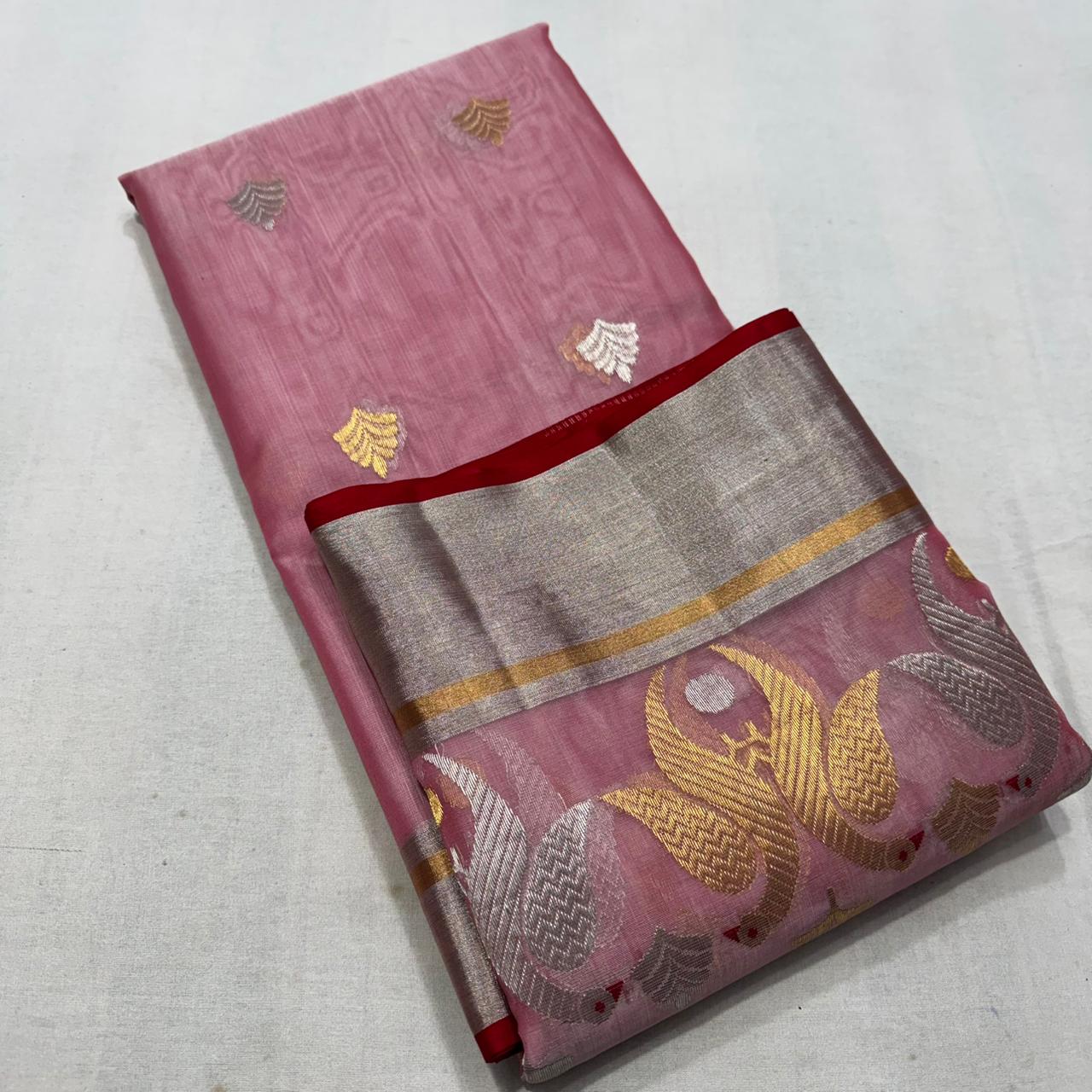 Delicate pink Chanderi handloom Katan silk saree featuring traditional sheer texture and intricate zari craftsmanship, draped beautifully.
