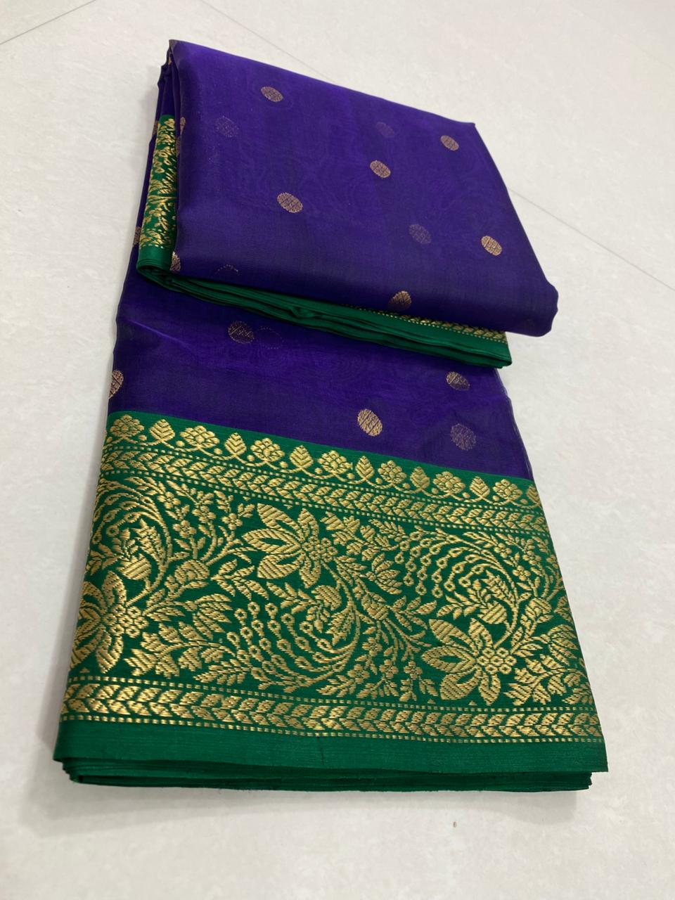 Dual tone purple Chanderi handloom Katan silk saree from Silk Tatva, featuring an intricate contrast green and gold zari floral pallu and border with matching buttas on a sheer body, as seen in Chanderi handloom Katan Silk Saree