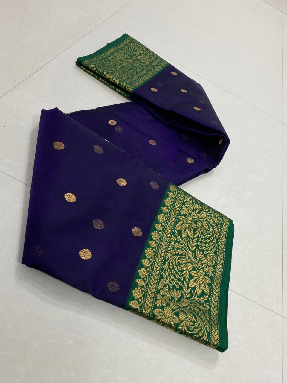 Dual tone purple Chanderi handloom Katan silk saree from Silk Tatva, featuring an intricate contrast green and gold zari floral pallu and border with matching buttas on a sheer body, as seen in Chanderi handloom Katan Silk Saree