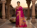 Dark Pink Paithani Handloom Pure Silk Saree with delicate self-woven zari buttas on the body and a tissue zari pallu featuring a pair of colorful peacocks perched on flowering branches.