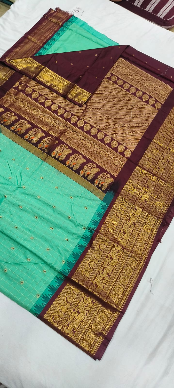 Elegant Gadwal semi Pattu silk saree draped to showcase its rich pallu and contrasting color combination