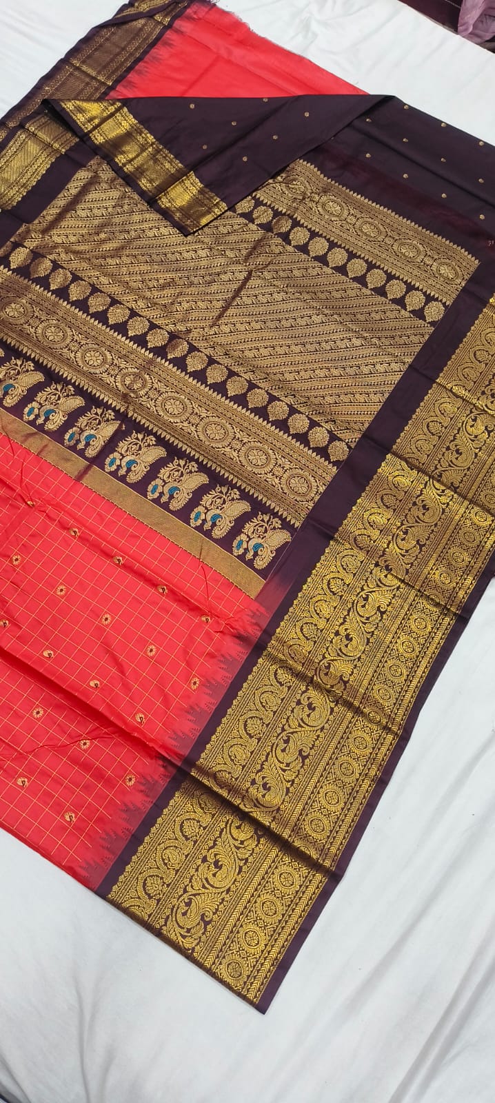 Elegant Gadwal semi Pattu silk saree draped to showcase its rich pallu and contrasting color combination