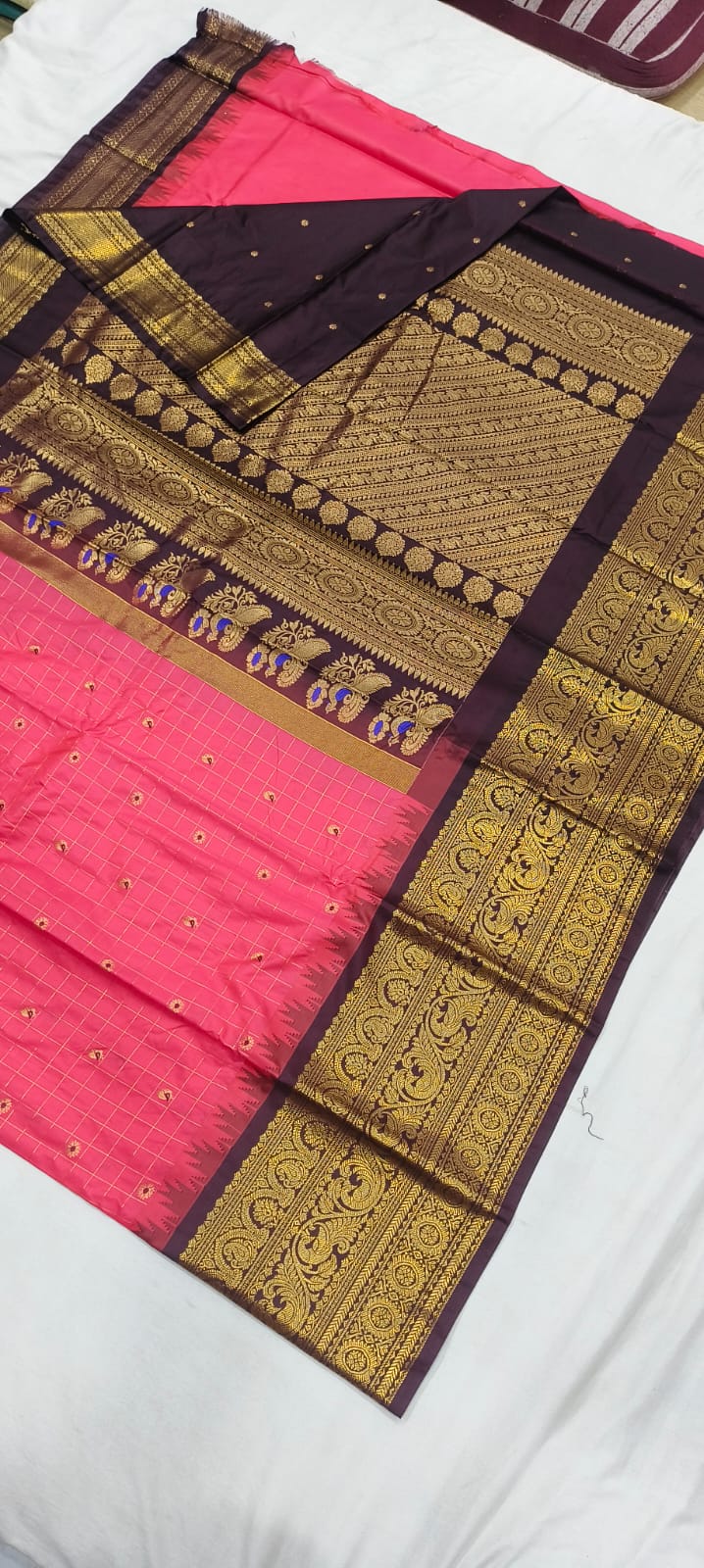 Elegant Gadwal semi Pattu silk saree draped to showcase its rich pallu and contrasting color combination