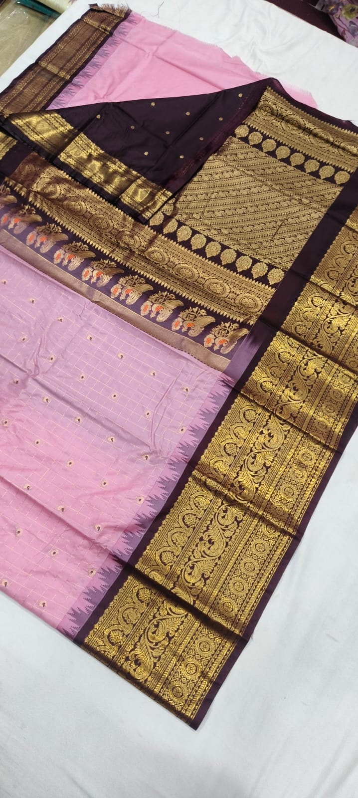 Elegant Gadwal semi Pattu silk saree draped to showcase its rich pallu and contrasting color combination