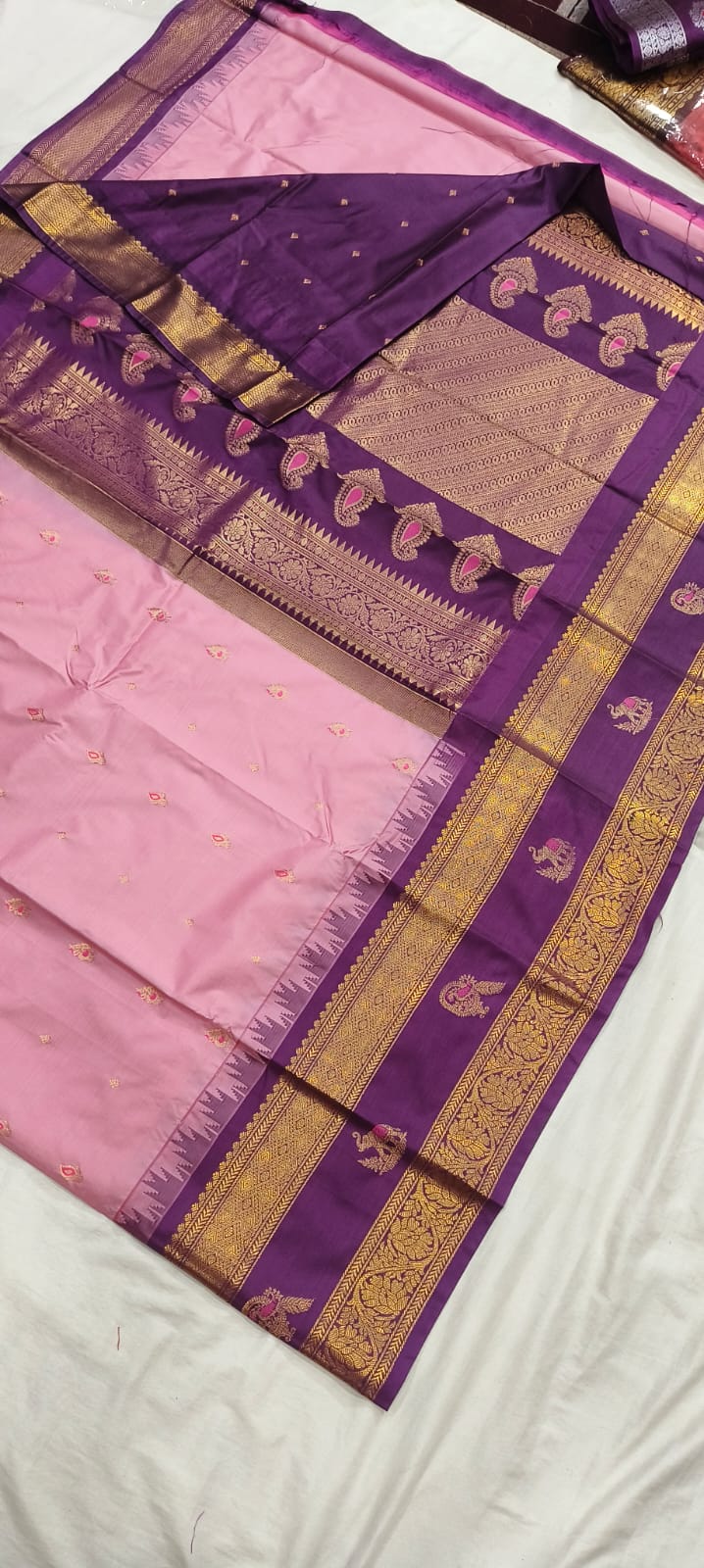 Elegant Gadwal semi Pattu silk saree draped to showcase its rich pallu and contrasting color combination