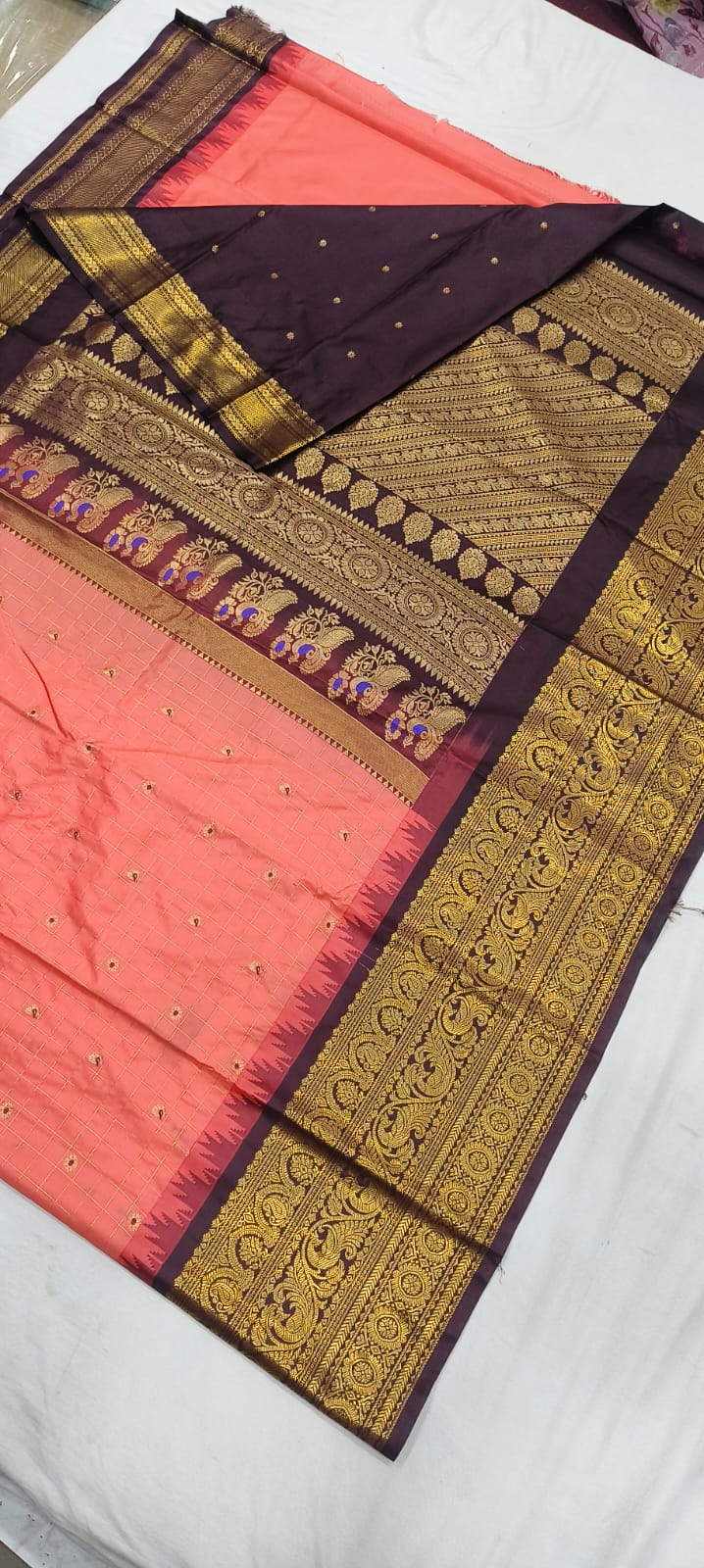 Elegant Gadwal semi Pattu silk saree draped to showcase its rich pallu and contrasting color combination