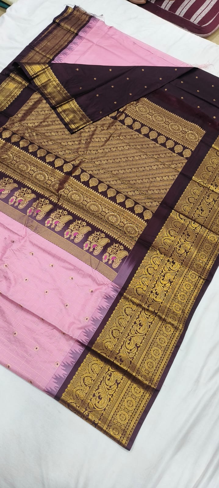 Elegant Gadwal semi Pattu silk saree draped to showcase its rich pallu and contrasting color combination
