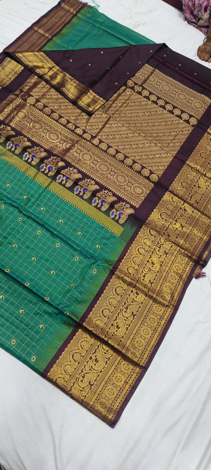 Elegant Gadwal semi Pattu silk saree draped to showcase its rich pallu and contrasting color combination