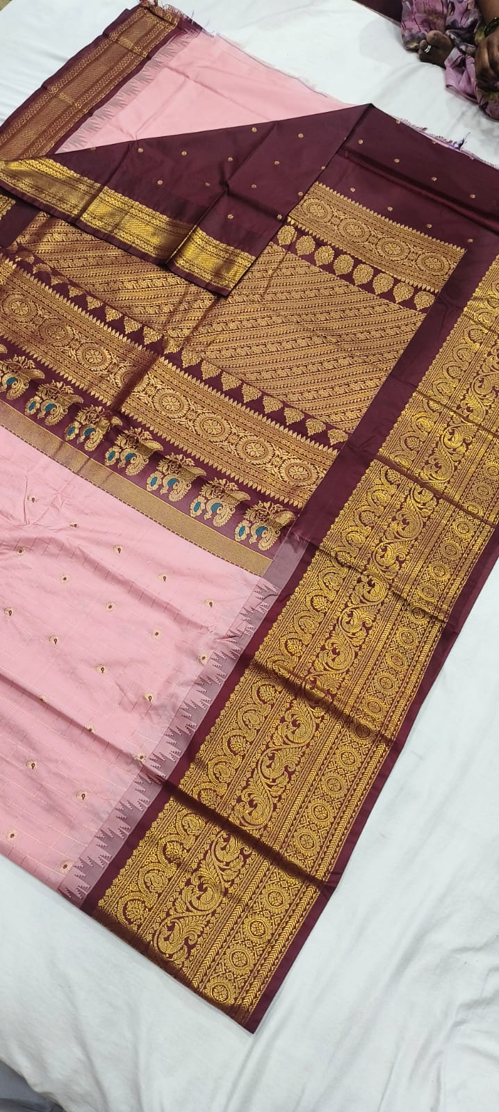 Elegant Gadwal semi Pattu silk saree draped to showcase its rich pallu and contrasting color combination