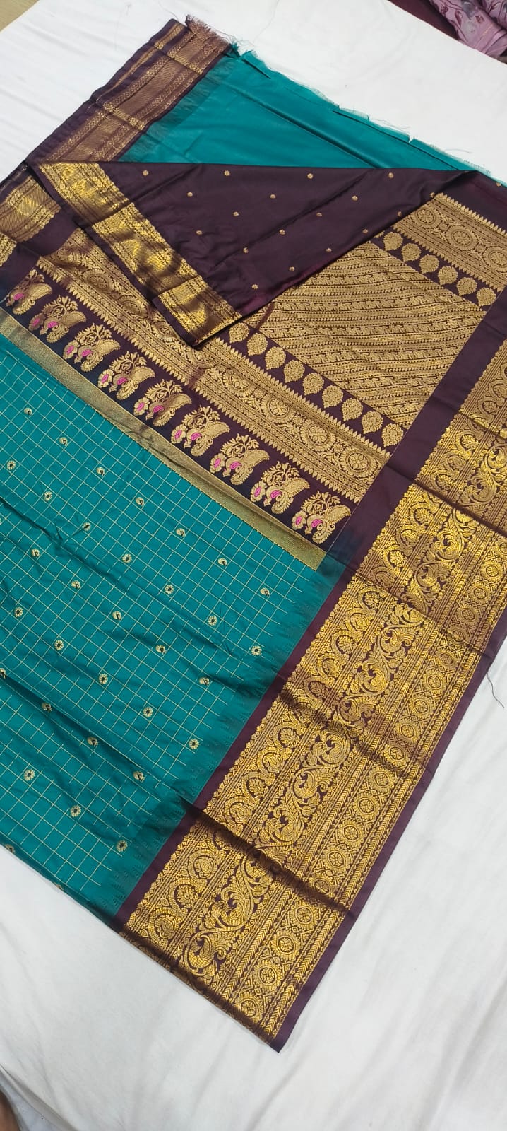 Elegant Gadwal semi Pattu silk saree draped to showcase its rich pallu and contrasting color combination