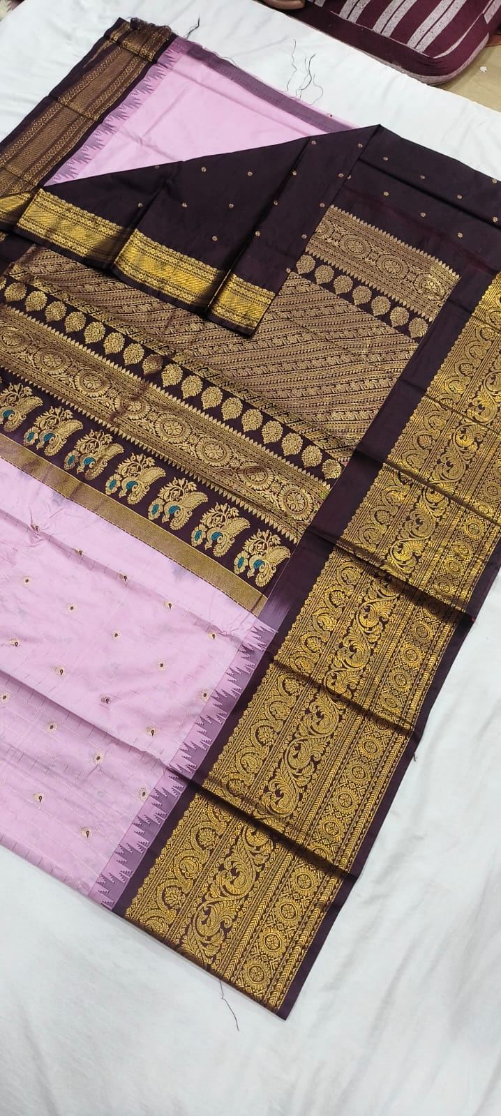 Elegant Gadwal semi Pattu silk saree draped to showcase its rich pallu and contrasting color combination