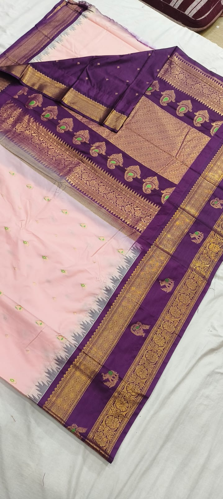 Elegant Gadwal semi Pattu silk saree draped to showcase its rich pallu and contrasting color combination