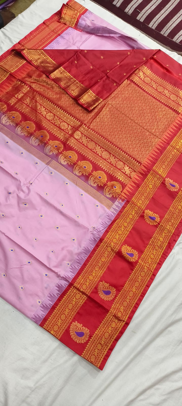 Elegant Gadwal semi Pattu silk saree draped to showcase its rich pallu and contrasting color combination