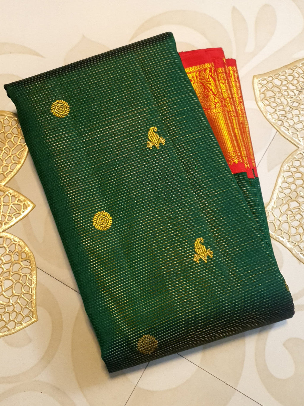 Bottle Green Kanchipuram Handloom 2G Gold Vairaoosi Silk Saree with all-over fine stripes, traditional buttas, and rich contrasting red and gold borders and pallu.