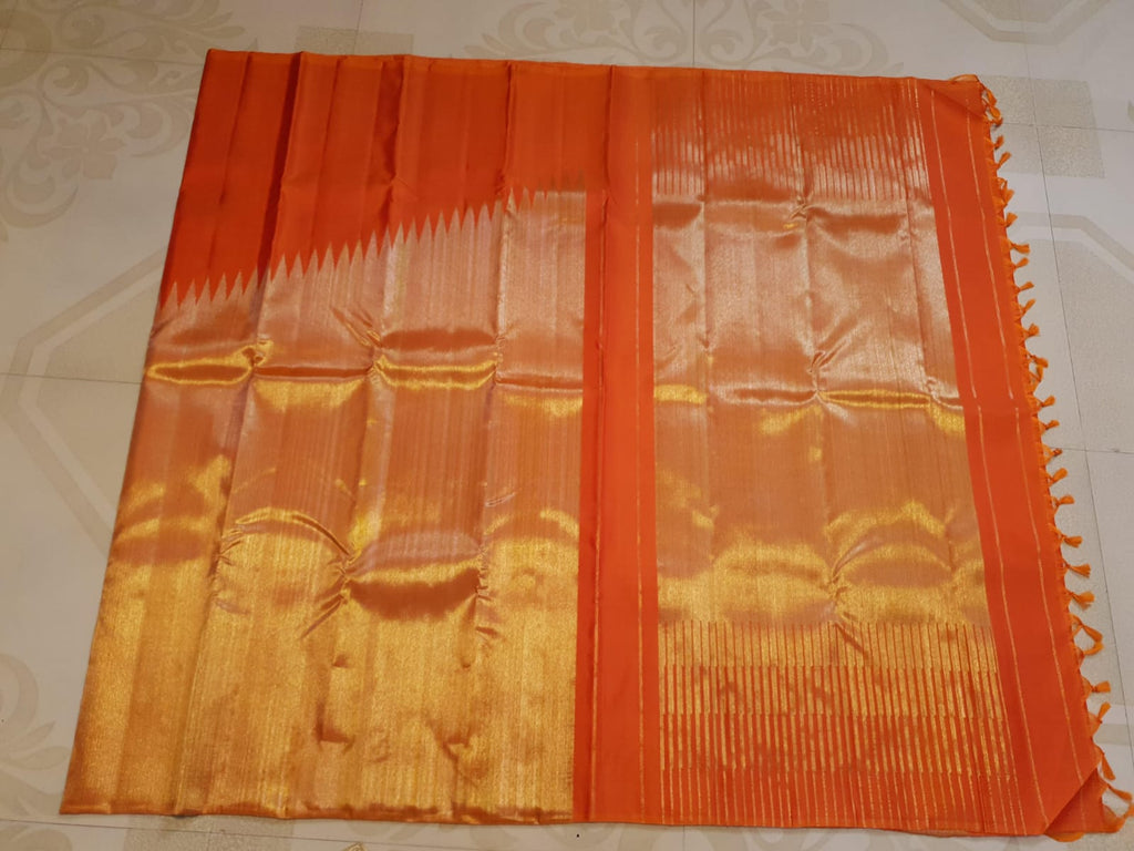 Chilly red Kanchipuram handloom 2G gold temple silk saree with rich gold zari weaving and traditional borders.