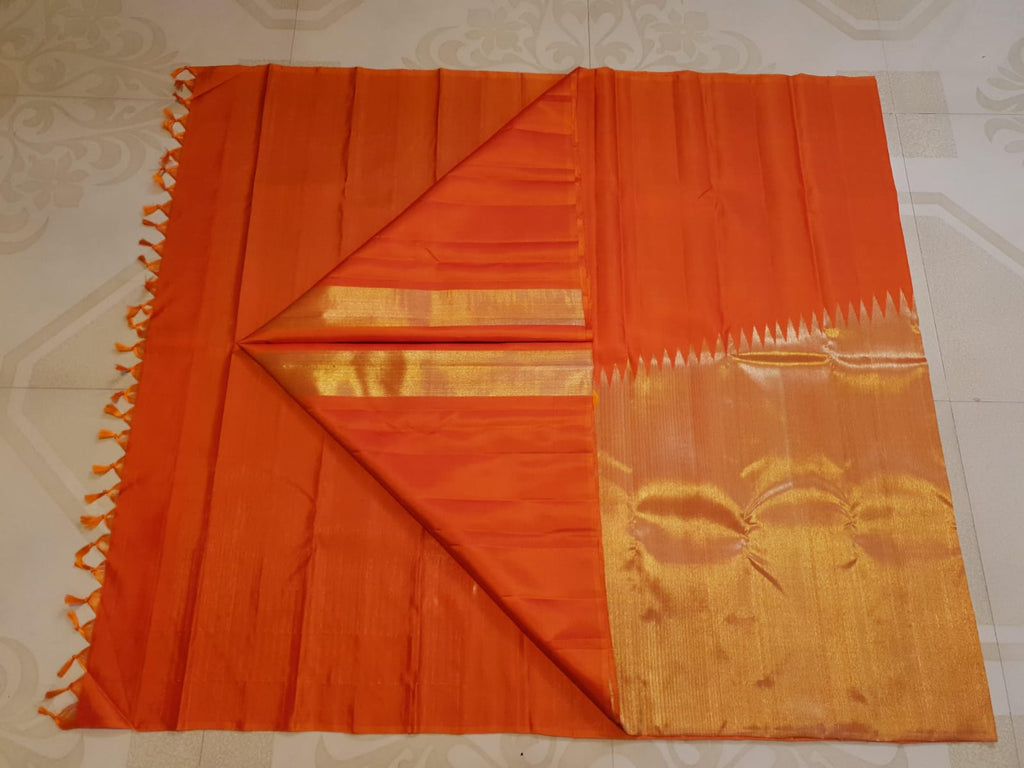 Chilly red Kanchipuram handloom 2G gold temple silk saree with rich gold zari weaving and traditional borders.