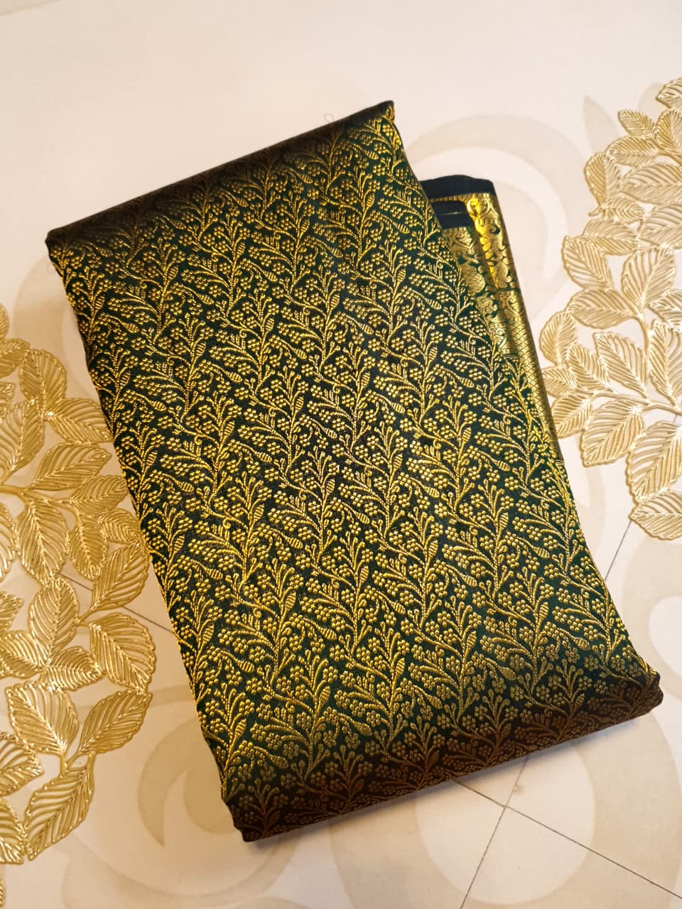 Bottle green Kanchipuram handloom 2G gold bridal silk saree featuring traditional rich zari borders and an all-over intricate brocade weave.
