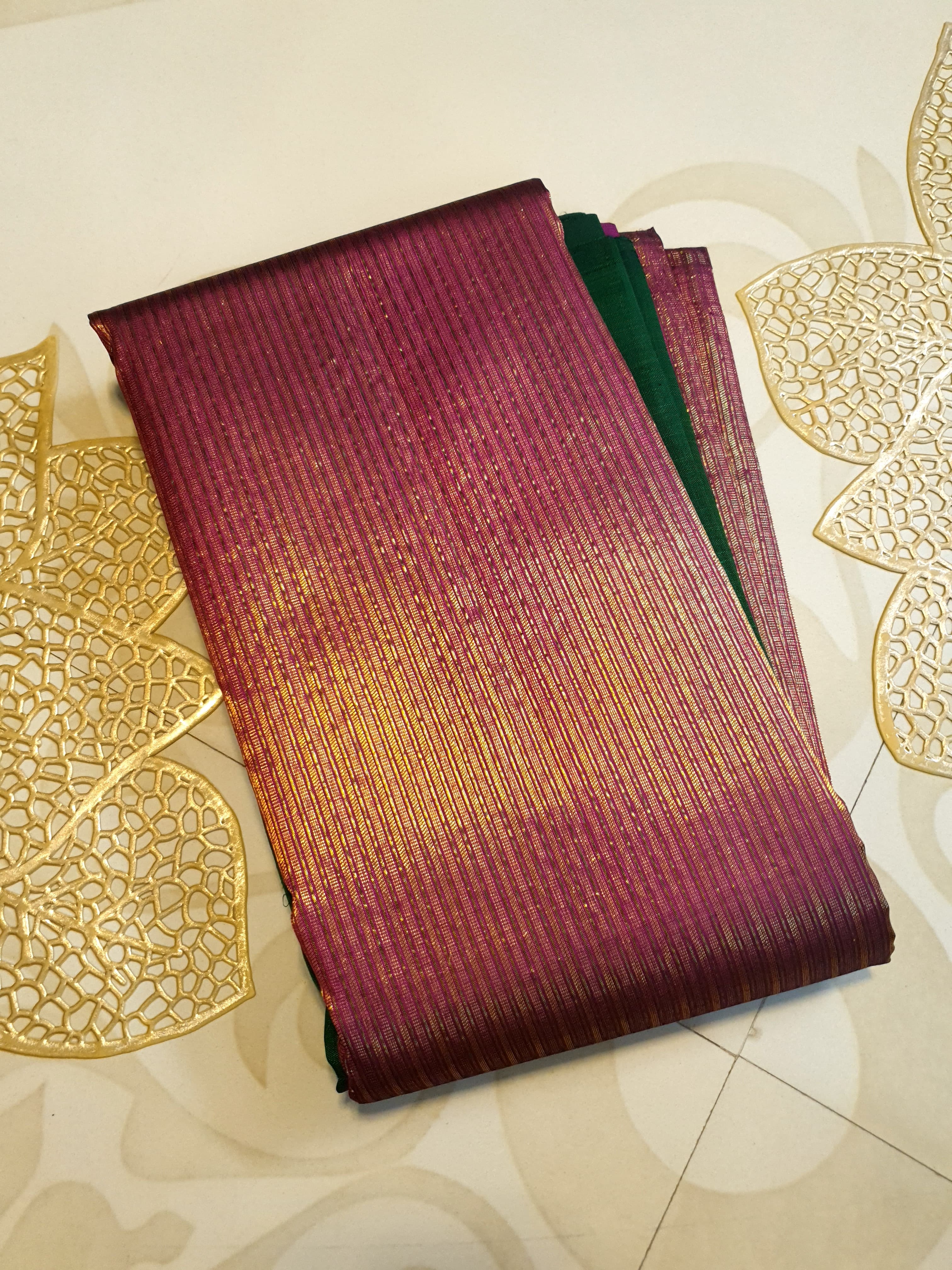 Bottle Green Kanchipuram handloom 2G gold temple silk saree featuring traditional gold zari weaving and classic temple borders.