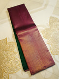 Bottle Green Kanchipuram handloom 2G gold temple silk saree featuring traditional gold zari weaving and classic temple borders.