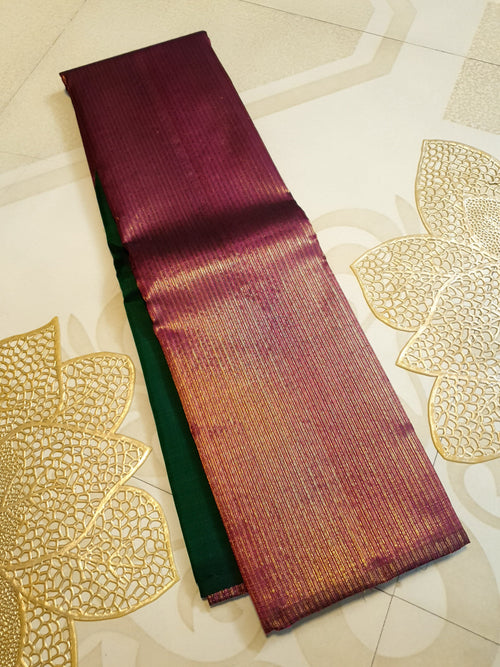 Bottle Green Kanchipuram handloom 2G gold temple silk saree featuring traditional gold zari weaving and classic temple borders.