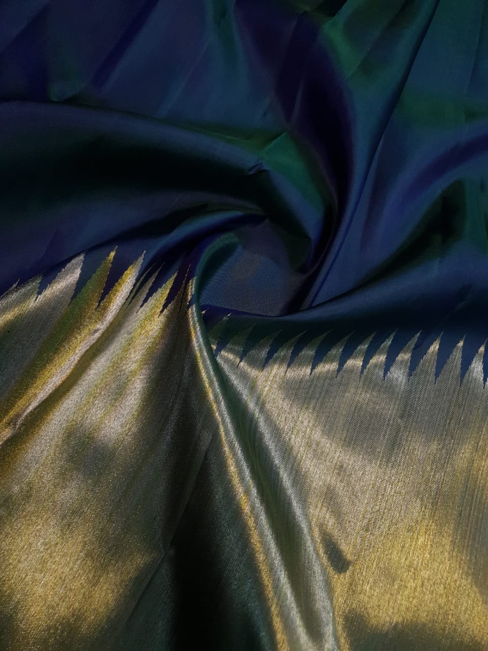Midnight Blue Kanchipuram handloom 2G gold temple silk saree featuring traditional gold zari weaving and classic temple borders.