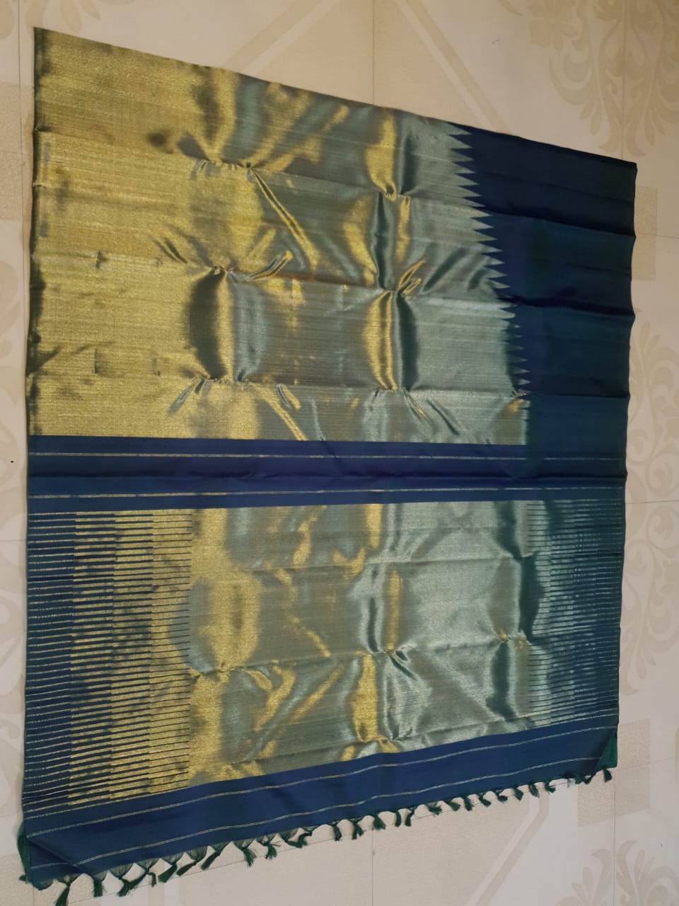 Midnight Blue Kanchipuram handloom 2G gold temple silk saree featuring traditional gold zari weaving and classic temple borders.