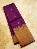 Magenta Kanchipuram handloom 2G gold pattu silk saree featuring traditional gold zari weaving and rich motifs.