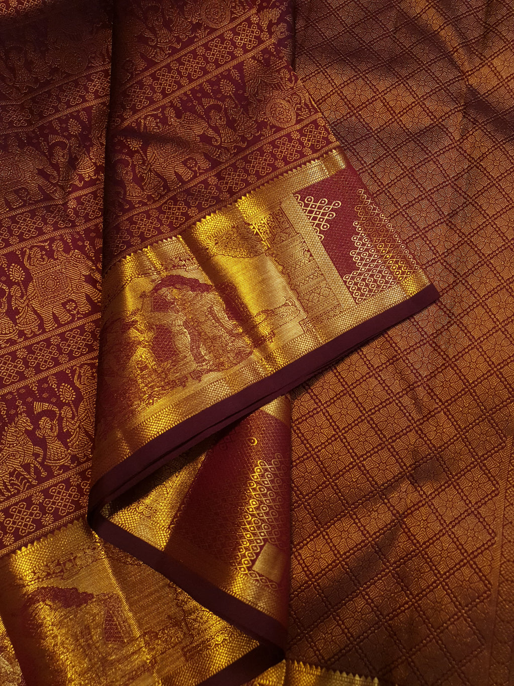 Rustic red Kanchipuram handloom 2G gold palaki design silk saree with rich gold zari weaving and traditional borders.