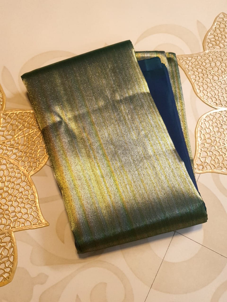 Midnight Blue Kanchipuram handloom 2G gold temple silk saree featuring traditional gold zari weaving and classic temple borders.