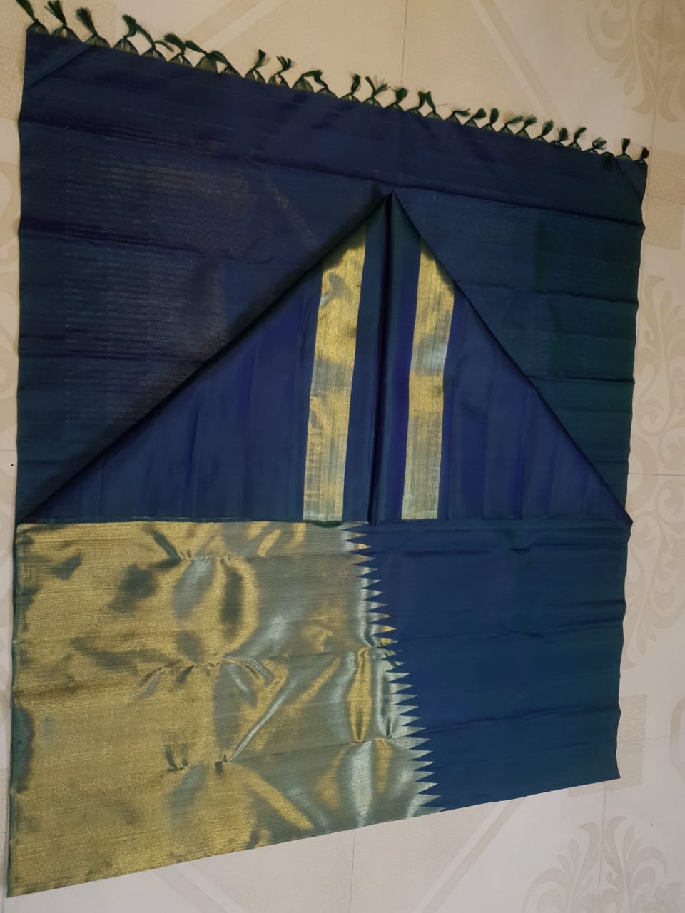 Midnight Blue Kanchipuram handloom 2G gold temple silk saree featuring traditional gold zari weaving and classic temple borders.