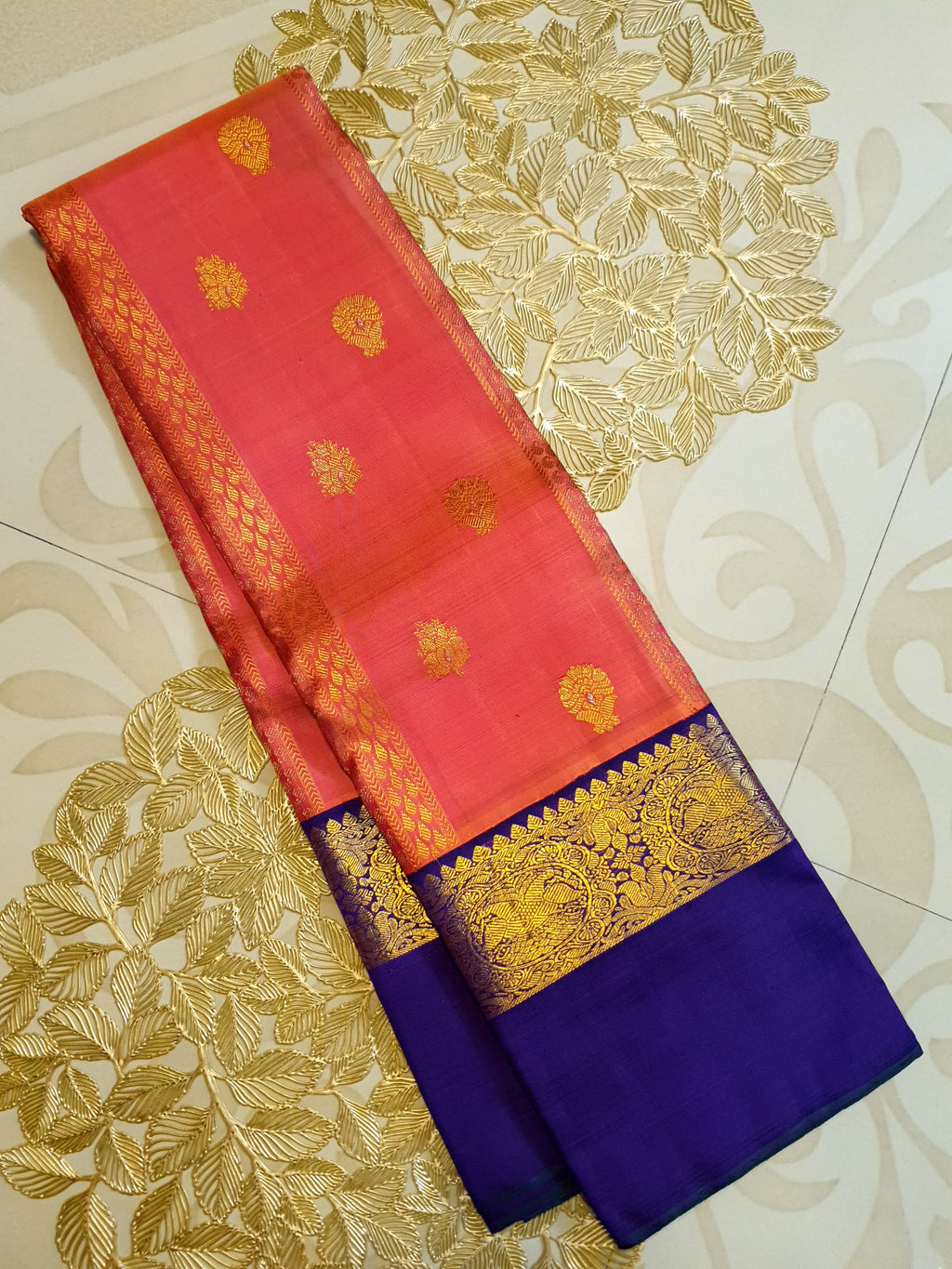 Kanchipuram Handloom 2G Gold Korvai Silk Saree with rich purple and gold zari borders and traditional motifs.