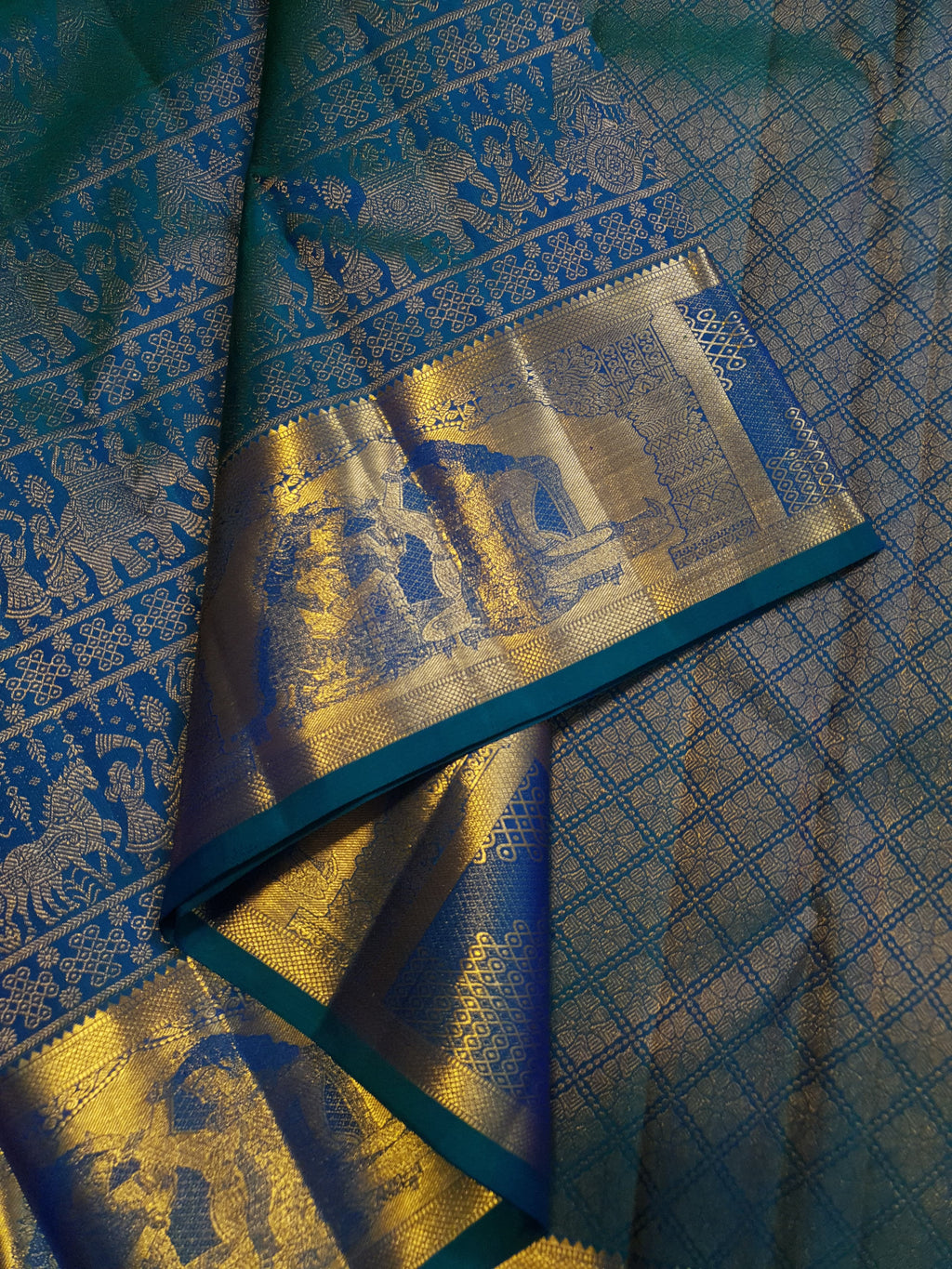 Dual Tone Peacock Blue Kanchipuram Handloom 2G Gold pattu silk saree featuring intricate palaki (Kalyana Pallakku) traditional gold zari weaving.