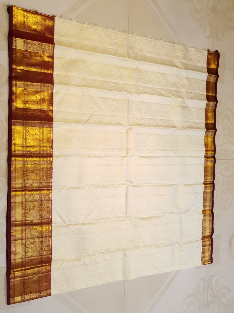 Off White Kanchipuram Handloom 2G Gold Pattu Silk Bridal Saree with rich red and gold zari borders