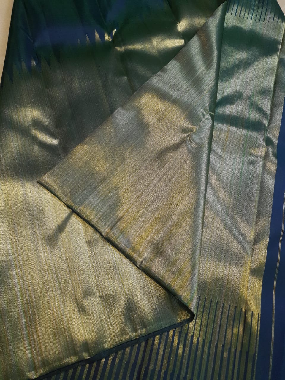 Midnight Blue Kanchipuram handloom 2G gold temple silk saree featuring traditional gold zari weaving and classic temple borders.