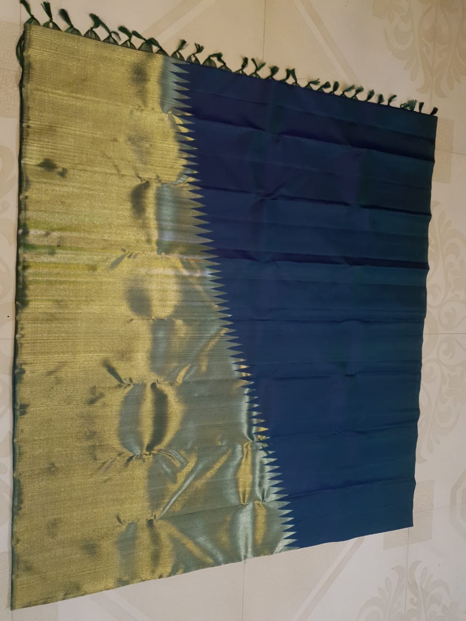 Midnight Blue Kanchipuram handloom 2G gold temple silk saree featuring traditional gold zari weaving and classic temple borders.