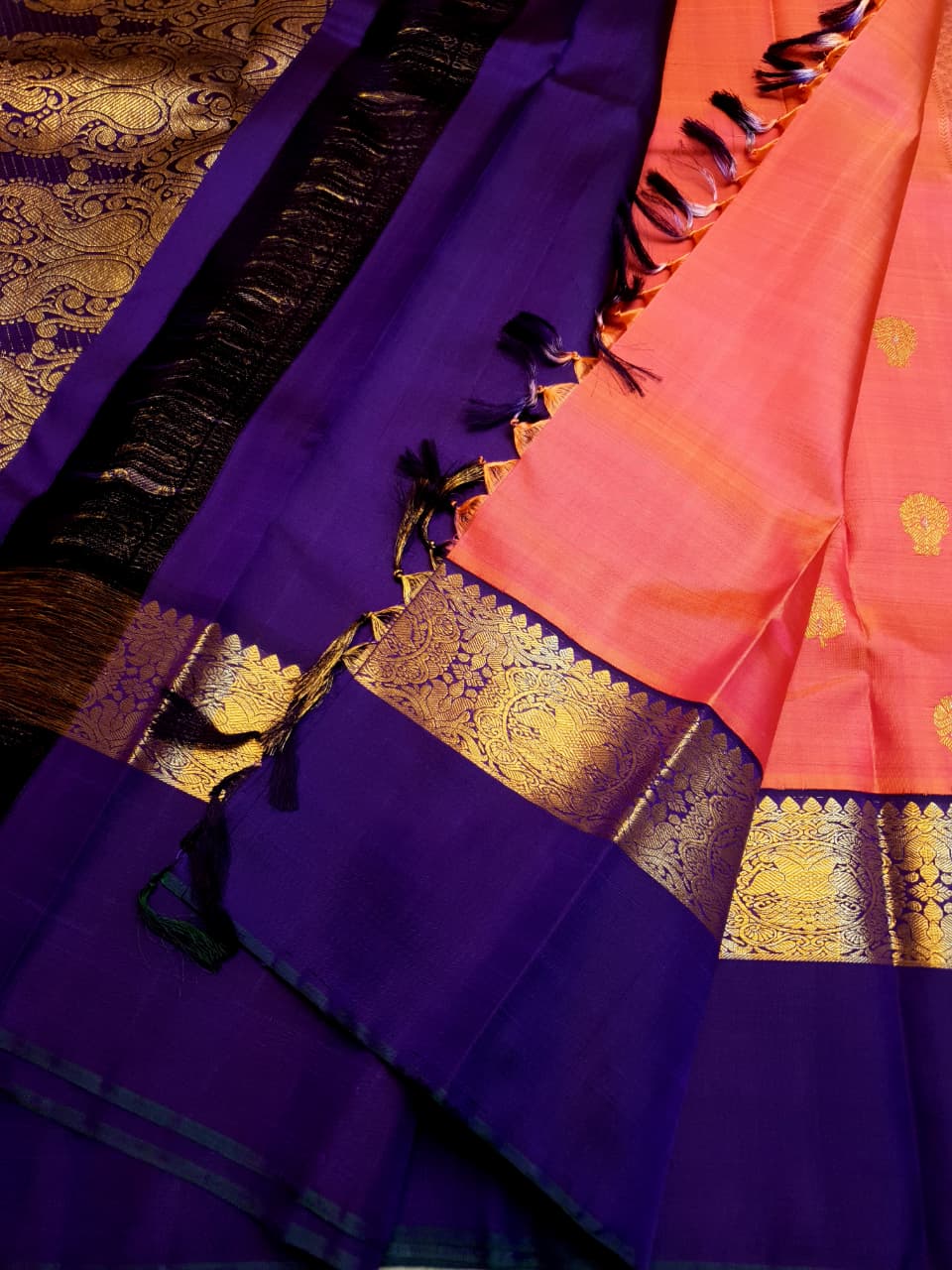 Kanchipuram Handloom 2G Gold Korvai Silk Saree with rich purple and gold zari borders and traditional motifs.