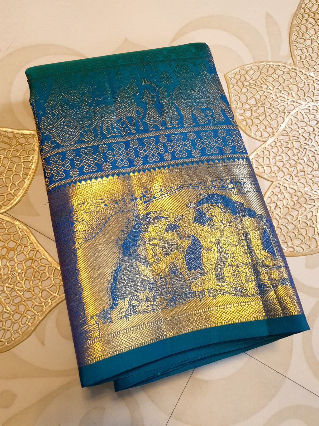 Dual Tone Peacock Blue Kanchipuram Handloom 2G Gold pattu silk saree featuring intricate palaki (Kalyana Pallakku) traditional gold zari weaving.