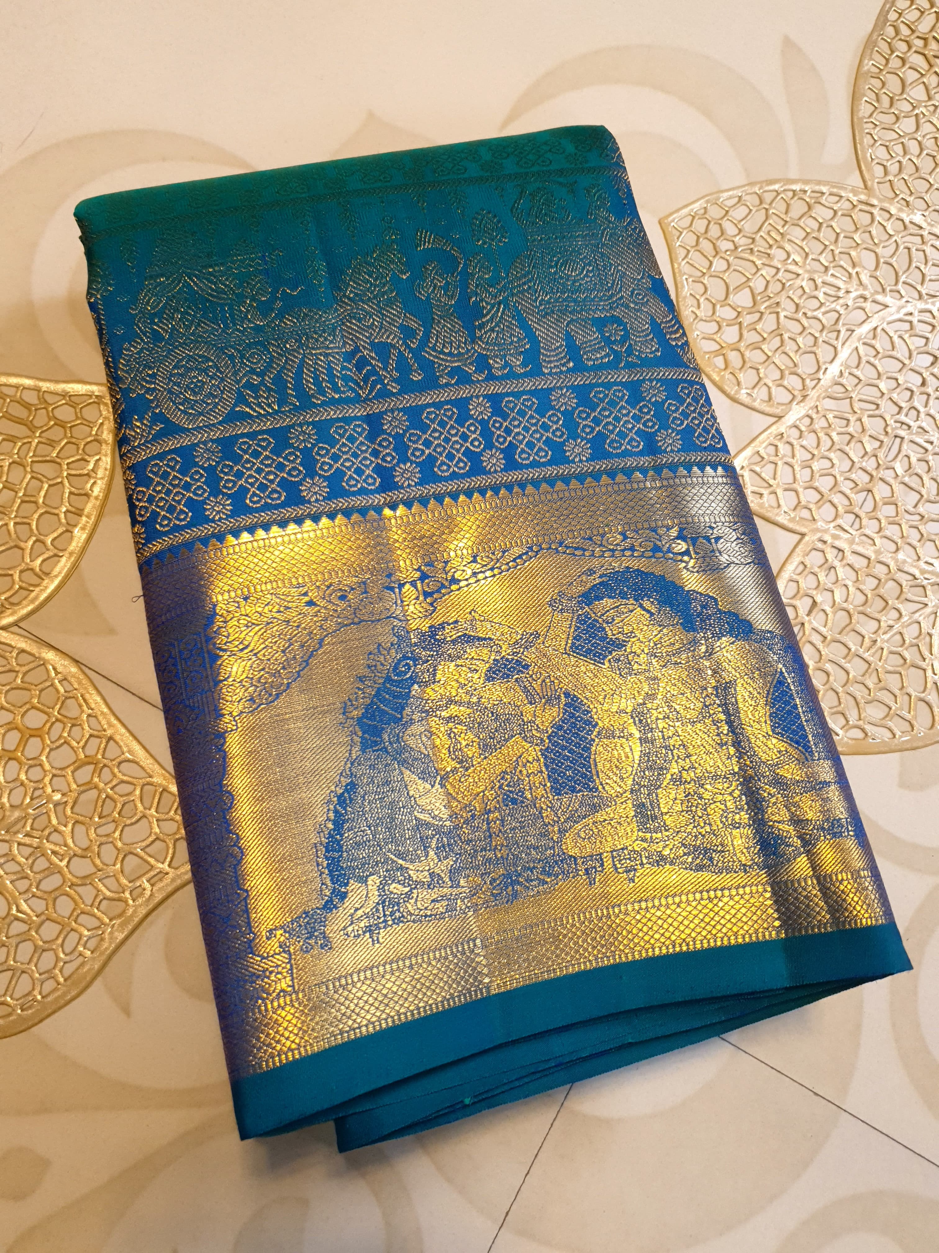 Dual Tone Peacock Blue Kanchipuram Handloom 2G Gold pattu silk saree featuring intricate palaki (Kalyana Pallakku) traditional gold zari weaving.