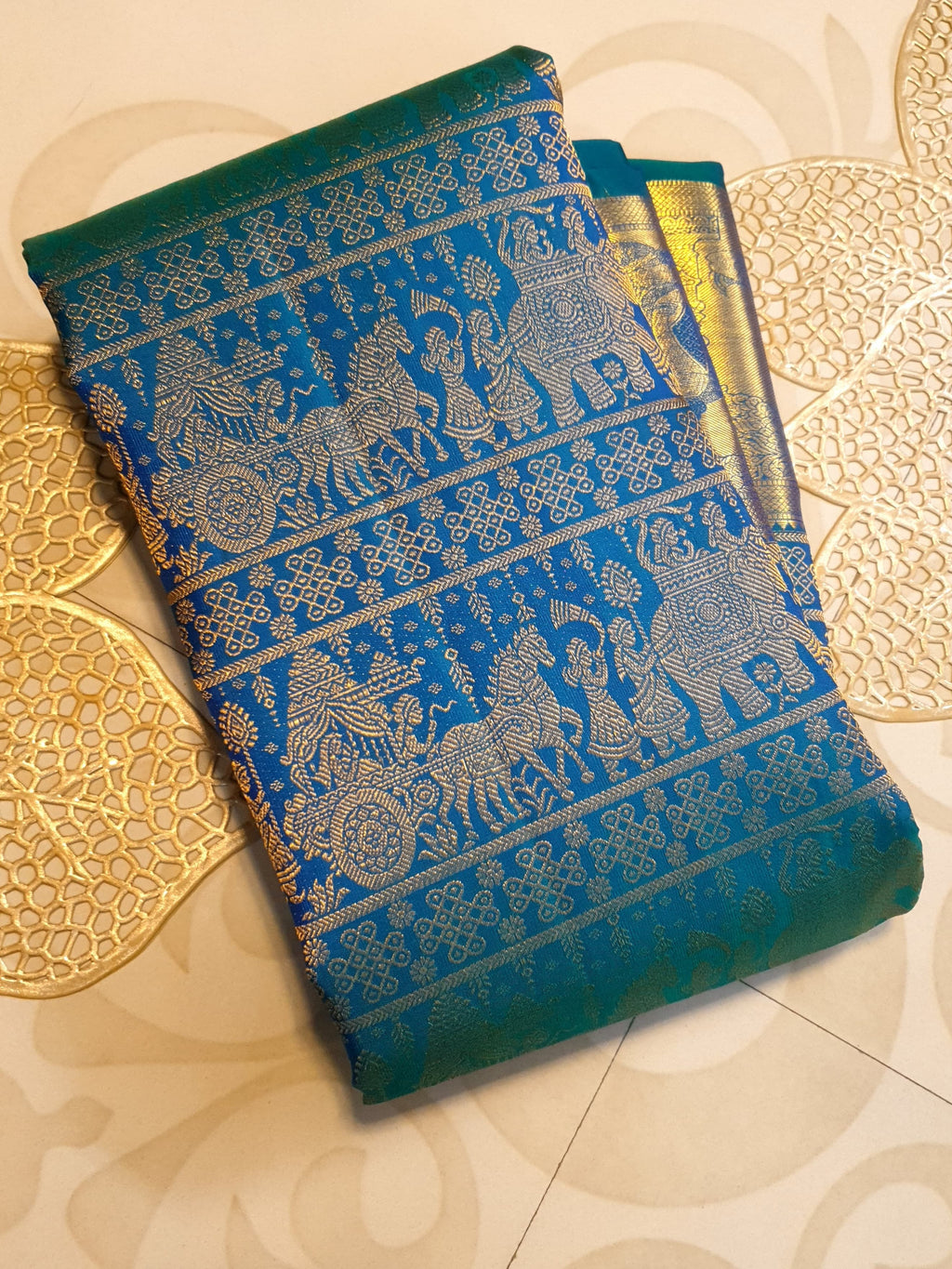 Dual Tone Peacock Blue Kanchipuram Handloom 2G Gold pattu silk saree featuring intricate palaki (Kalyana Pallakku) traditional gold zari weaving.