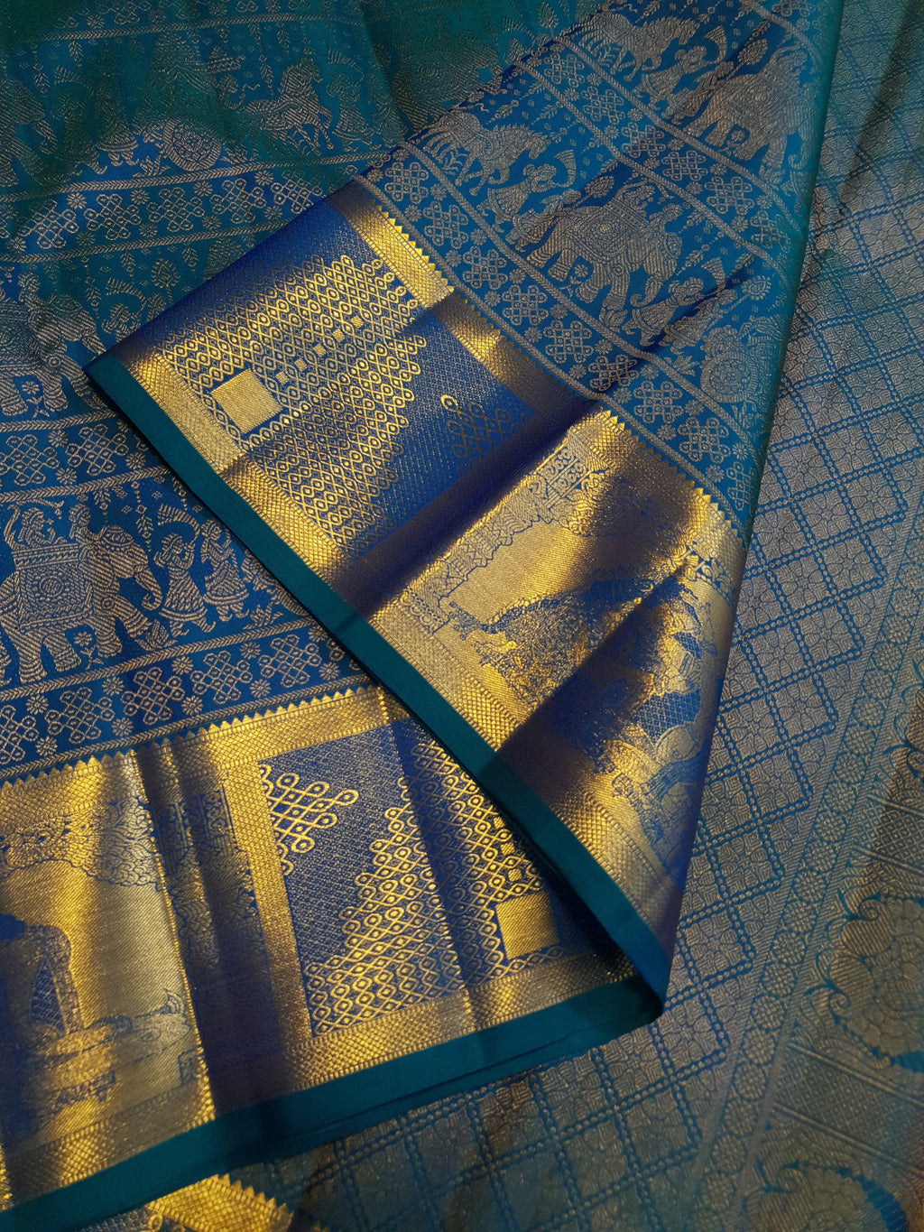 Dual Tone Peacock Blue Kanchipuram Handloom 2G Gold pattu silk saree featuring intricate palaki (Kalyana Pallakku) traditional gold zari weaving.