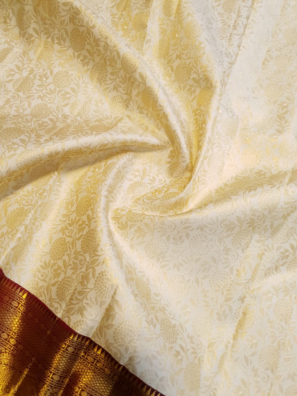 Off White Kanchipuram Handloom 2G Gold Pattu Silk Bridal Saree with rich red and gold zari borders